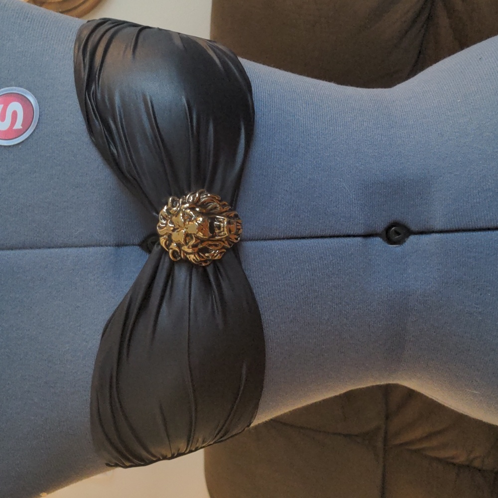 Victoria's Secret bandea/strapless black bikini top with gold lion's head detail